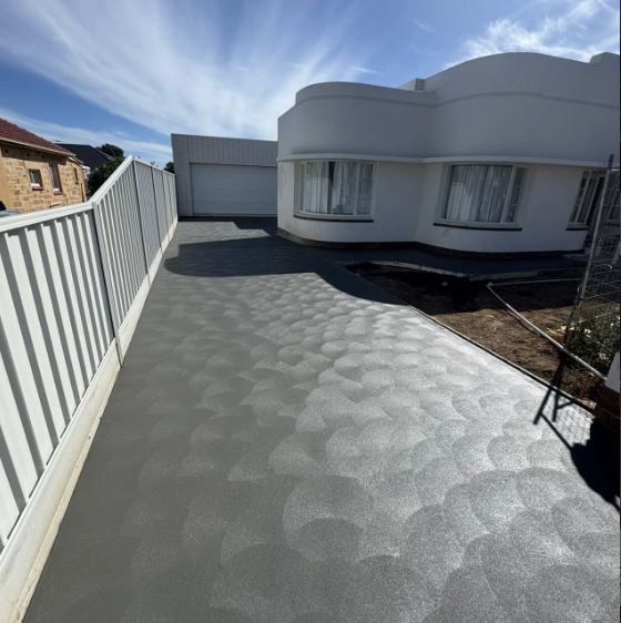 Charcoal coloured driveway